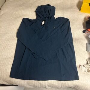 Travis Mathew dark blue hoodie